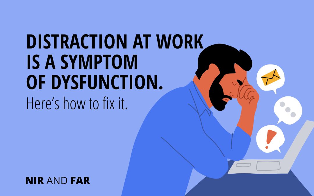 Man distracted at work by notifications from his laptop